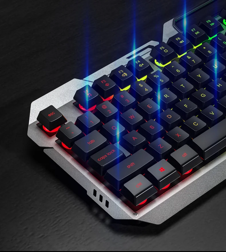 Крупный план угла AULA F2023: парящие колпачки на металлической панели и свет под клавишами