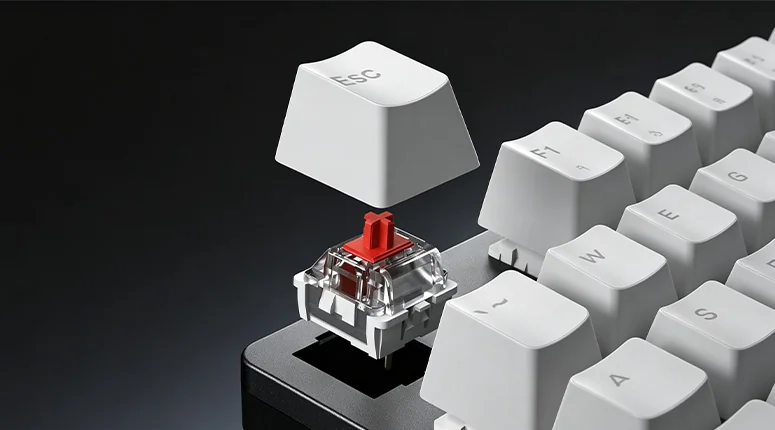 The Esc keycap lifted off the AULA F2088 Air, exposing a mechanical switch in its hot-swap socket