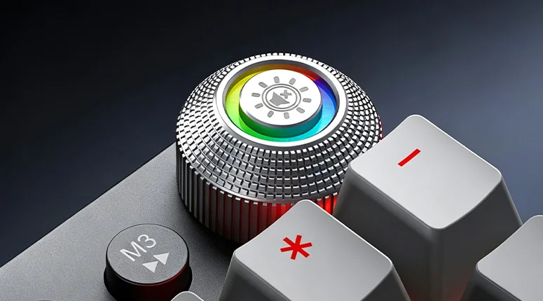 The AULA F2088 Air metal knob with its lit RGB ring, next to the M3 button