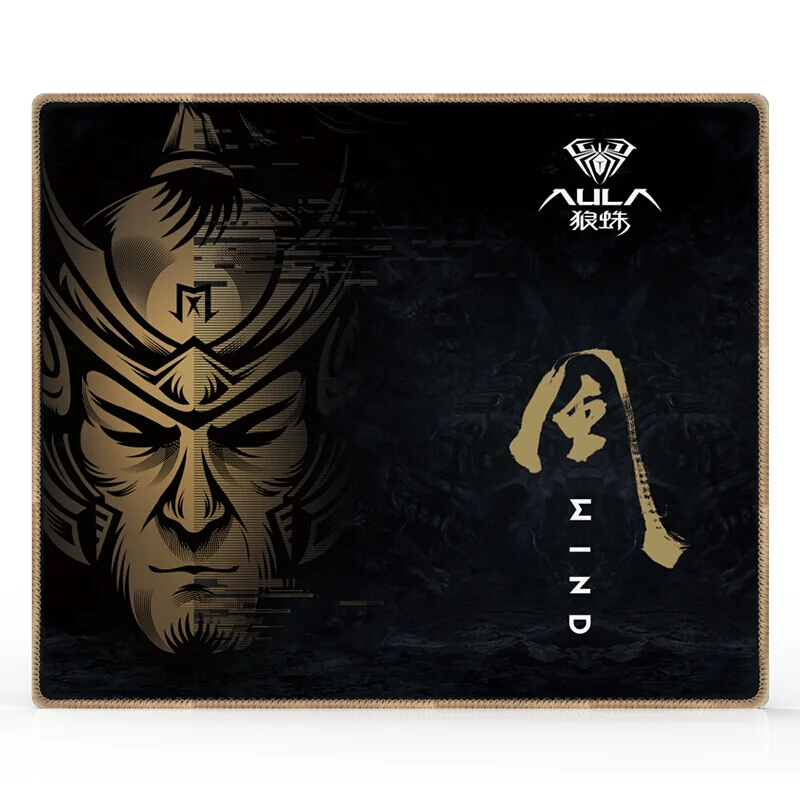 AULA MP-W mouse pad from above: black cloth, a gold warrior mask and the word WIND, stitched edge