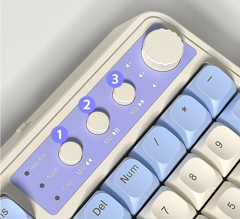 Close-up of the AULA S99: the knob, the round M1-M3 keys and the charge, Num and Caps indicators
